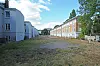 Auf dieser Rasenfläche sollen in Zukunft die 19 Townhouses entstehen.