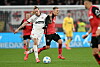 Jackson Irvine im Zweikampf mit Alejandro Grimaldo