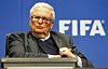 Dr. Theo Zwanziger sitzt auf einem Stuhl bei der FIFA