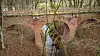 Alte Bahnbrücke im Wald