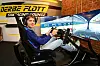 Tim Tramnitz am Rennsimulator im „Derbe Flott“