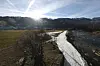 Die Sonne geht über den Bergen im Val di Fiemme auf.