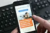 Handy mit Organspende-Webseite