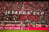 Bayern-Fans mit einem Banner für Ultra Sankt Pauli