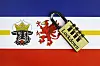 Länderfahne von Mecklenburg-Vorpommern und Schloss mit Lockdown Länderfahne von Mecklenburg-Vorpommern und Schloss mit dem Wort Lockdown darauf.