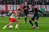 Leipzigs Christoph Baumgartner und Frankfurts Mario Götze im direkten Duell.