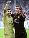 Mit wichtigen Paraden und dem Siegtor: Nikola Vasilj (l.) und Jakov Medic waren die Matchwinner in Magdeburg.