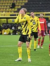 Haaland Hände vor Kopf