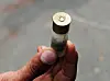 Hand mit Patrone