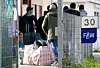 Geflüchtete aus Syrien kommen im Oktober bei einer Erstaufnahmeeinrichtung an.