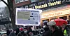 Demonstration am 23. Dezmeber von Kritikern der Corona-Maßnahmen und Gegnern der Impfpflicht unter dem Motto: Wir vereint. Auf dem Schild sind Falschinformationen über die „Wirkung“ von Olivenöl bei Corona.