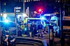 Polizisten stehen am Tatort. In Brüssel sind am Montagabend zwei Menschen erschossen worden.