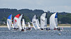 Segelboote fahren während einer Regatta bei der Travemünder Woche auf der Ostsee. etzt startet eine ganz besondere Ragatta bei Lübeck.