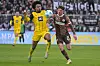 Philipp Treu im Duell mit Karim Adeyemi