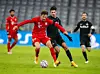 Dominik Szoboszlai (r.) im Duell mit Bayerns Leon Goretzka