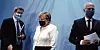 Hamburgs Bürgermeister Peter Tschentscher (r., SPD) mit Markus Söder und Angela Merkel auf einer Pressekonferenz im September.