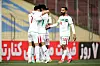 Irans Nationalspieler bejubeln einen Treffer.