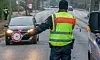 Polizisten bei einer Verkehrskontrolle (Symbolfoto).