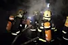 Chinesische Feuerwehrleute bei der Brandbekämpfung.