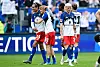 Yussuf Poulsen, Louis Lemke und Albert Grønbæk bejubeln einen Sieg mit dem HSV
