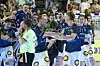 Die Spieler des Bergischen HC feiern ausgelassen