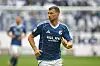 Edin Dzeko mit angewinkelten Armen im Spiel