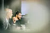 Eine Gruppe Kolleginnen und Kollegen in einem Meeting