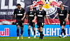 St. Pauli-Profis Andreas Hountondji, Jackson Irvine, Martijn Kaars und Eric Smith sind enttäuscht in Leipzig