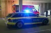 Polizeiwagen Krankenwagen Parkhaus