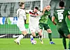 Eric Smith und Karol Mets gegen Wolfsburgs Eriksen