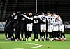 Spieler des ETSV machen einen Teamkreis in der Oberliga Hamburg