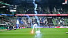 Ein Feuerwerkskörper fliegt aus dem Gästeblock im Weserstadion auf den Rasen.