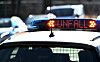 Ein Polizeiauto mit der Aufschrift „Unfall”. (Symbolbild)
