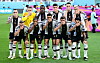 DFB-Team hält die Hand vor den Mund bei der WM 2022