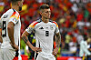 Toni Kroos (r.) und Niclas Füllkrug sind enttäuscht.