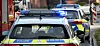 Ein Streifenwagen der Polizei ist mit Blaulicht im Einsatz.