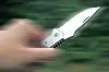 Hand mit Messer