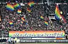 Regenbogenfahnen und ein Banner mit der Aufschrift „All colours are beatiful“ am MIllerntor
