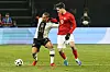 Kenan Yildiz im Zweikampf mit Deutschlands Leroy Sané.