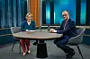 Moderatorin Caren Miosga (l.), sitzt vor Sendungsbeginn ihrer neuen Talkshow mit Gast Friedrich Merz (CDU) im Studio.