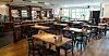 Ob im Innenbereich oder auch im Biergarten: Das Schweinske Restaurant Wandsbek bietet gemütliche Atmosphäre abseits des Trubels am Wandsbeker Quarree.