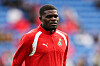 Ghana-Spieler im roten Trainingsshirt beim Aufwärmen im Cardiff City Stadium vor dem Länderspiel gegen Wales.
