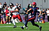 Sea-Devils-Quarterback Maack läuft vor Kölns Weitz weg