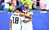 Nathaniel Brown und Jonathan Tah in weißen Deutschland-Trikots nach dem WM-Spiel in Foxborough.