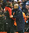 Jürgen Klopp und Arsène Wenger reagieren an der Seitenlinie beim Premier-League-Spiel in Liverpool.
