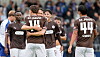 St. Pauli-Spieler jubeln nach dem Tor gegen Kickers Emden