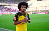 Karim-David Adeyemi jubelt im gelb-schwarzen Dortmund-Trikot auf dem Rasen.