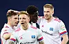 Simon Terodde feiert ein HSV-Tor mit Amadou Onana, Sonny Kittel und Robin Meißner.
