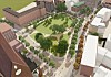 Luftaufnahme eines grünen Stadtparks mit Wegen, Bäumen und umliegenden Gebäuden.