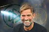 Jürgen Klopp vor DFB-Logo und Bundesadler als Fotomontage zum möglichen Bundestrainer-Wechsel.